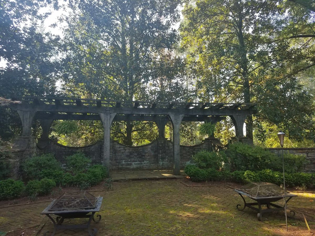 Stone and timber garden pergola